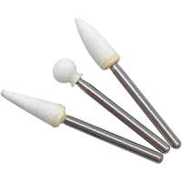 A set of corundum (4pcs Arkansas) and silicone (2pcs) heads for a turbine handpiece for grinding and polishing